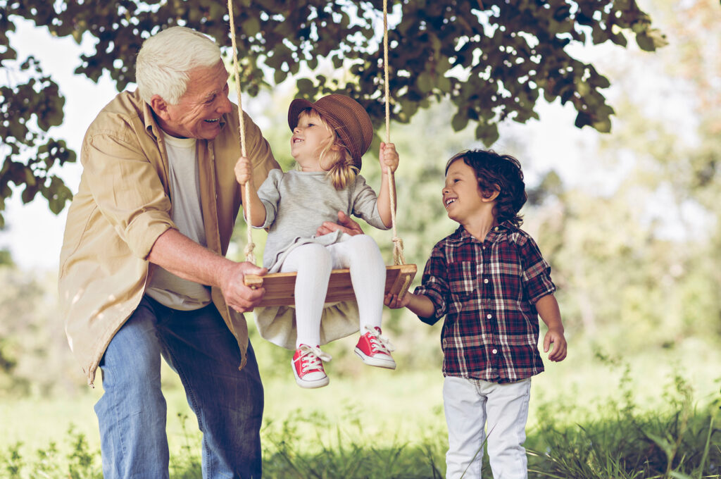 flying colours blog image Families Who Cut Their Inheritance Tax Bill Grandad spending time with grandkids representing families Who Cut Their Inheritance Tax Bill